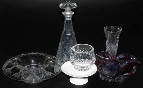 A group of cut glasswares, including a Waterford cut glass sweet meat bowl, trumpet shaped vase, together with a decanter and stopper, and a Maison Porcelaine Limoges white glazed porcelain pedestal sweet meat dish. (a quantity)