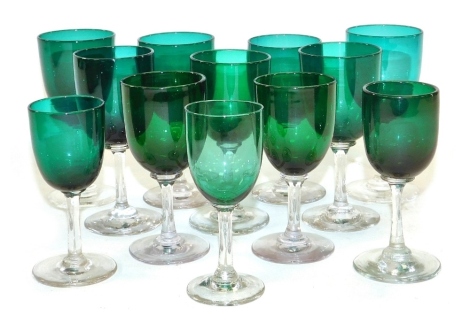 A group of Edwardian green wine glasses. (12)