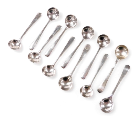 Eleven Victorian and later silver salt spoons, varying markers, assays and dates, 0.94oz.