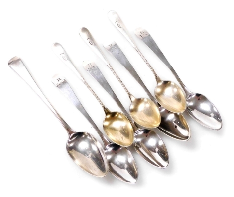 A set of four George III silver Old English pattern teaspoons, monogram engraved, London 1804, together with a further George III teaspoon and three Continental white metal coffee spoons, each with a twisted handle, initial engraved, stamped sterling, 2.7