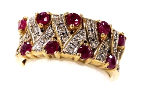 A 9ct gold ruby and diamond ring, in a compressed lattice work design, size I, 3.5g.