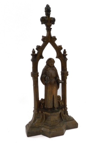 A late 19thC Continental cast iron doorstop, of Gothic form cast with a monk, 51cm high.