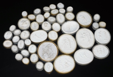 A group of 19thC Grand Tour plaster cameos, depicting mythological figures, busts of Roman emperors, etc. (a quantity)