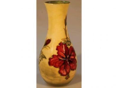 A Walter Moorcroft baluster vase with hibiscus pattern