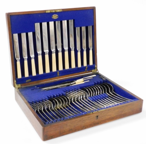 A Croisdale Old English pattern silver plated canteen of cutlery, six place settings, oak cased.