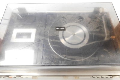 A Sanyo Solid State stereo system, model GXT 4540K, and a pair of Rank Organisation speakers, model number A1007. Buyer Note: WARNING! This lot contains untested or unsafe electrical items. It is supplied for scrap or reconditioning only. TRADE ONLY - 3