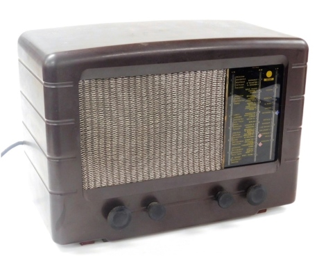 A Pye brown Bakelite cased radio.