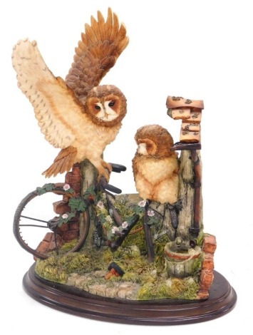 A Country Artist sculpture modelled as Tawny Owl pair, sculptured by David Haye 1999.