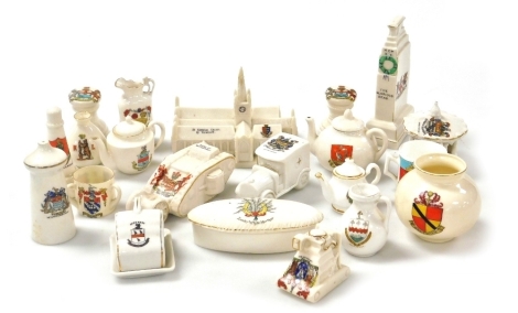 Goss and crested china, including a pair of capstans, Arms of Heckington, the Cenotaph, Arms of The City of London, St Nicholas Church Yarmouth, Arms of Great Yarmouth, boxed camera, Arms of Leigh on Sea, and a model of a World War One British Tank, Arms 