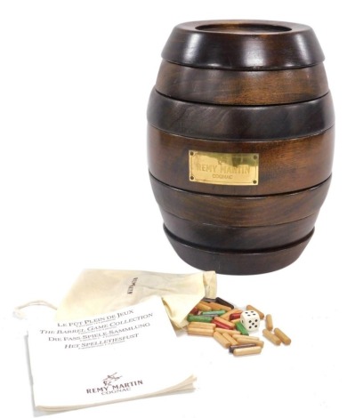 A Remy Martin Cognac oak barrel game collection, with pegs, dice and instructions, 27cm high.