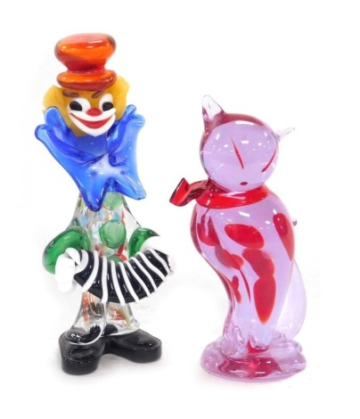 A Murano glass figure of a clown, 24cm high, together with a Murano glass figure of a stylised cat, in seated pose, with a bow around it's neck, 20.5cm high. (2)