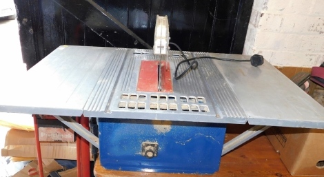 A Clarke Woodworker ten inch table saw.