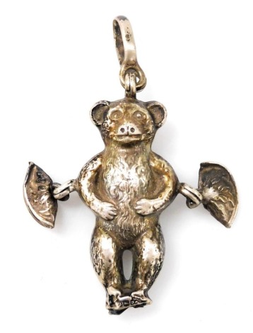 A silver child's rattle, modelled as a teddy bear, hallmarks indistinct, 13.5g.