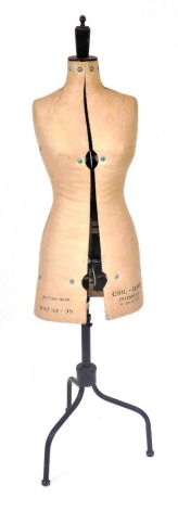 An early 20thC dress maker's dummy, bust 32-39, marked Chil-Daw Pioneer, number 344739, on a cast iron adjustable stand, 153cm high.