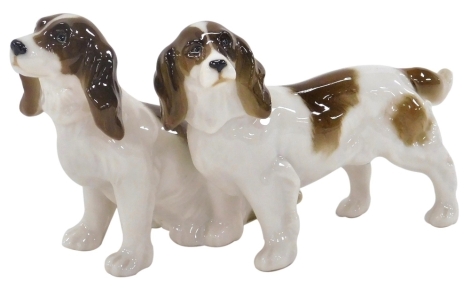 A Hutschenreuther porcelain figure group of a pair of Spaniels, printed mark, 14.5cm wide.