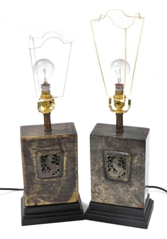 A pair of Chinese hardstone table lamps, of block form, carved with dragons, raised on stepped bases, 53cm high. Buyer Note: WARNING! This lot contains untested or unsafe electrical items. It is supplied for scrap or reconditioning only. TRADE ONLY