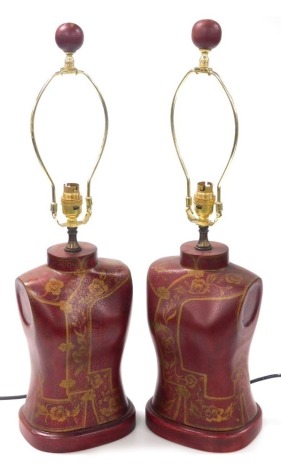 A pair of Chinese faux red lacquer table lamps, of female bust form, gilt decorated with flowers, 40cm high. Buyer Note: WARNING! This lot contains untested or unsafe electrical items. It is supplied for scrap or reconditioning only. TRADE ONLY