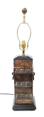 A Chinese copper and brass table lamp, of rectangular section, with two ring handles, and pierced panel decoration, raised on a stepped square base, 68cm high. Buyer Note: WARNING! This lot contains untested or unsafe electrical items. It is supplied for 