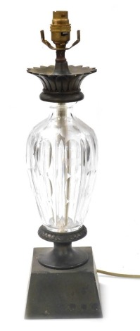 An early 20thC Continental cut glass and brass table lamp, 49cm high.