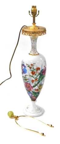 An 18thC French milk glass vase, of baluster form, painted with flowers, brass mounted and converted to a table lamp, 65.5cm high. Buyer Note: WARNING! This lot contains untested or unsafe electrical items. It is supplied for scrap or reconditioning only.