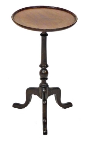 A Georgian style mahogany wine table, raised on turned column, over three cabriole legs, 52cm high, 29cm wide.