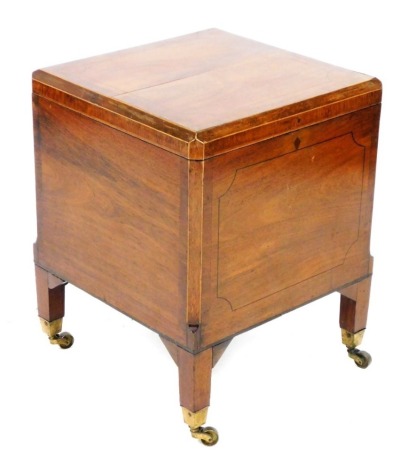 A George III mahogany and crossbanded cellarette, converted to a coal box, with a twin handled tin interior, raised on turned square legs, on castors, 55cm x 43cm.