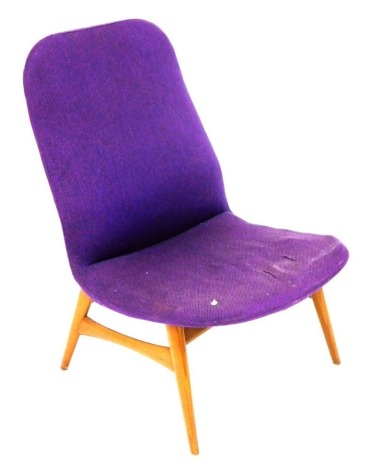 A 1960s light elm armchair, possibly Ercol, upholstered in purple fabric, 58cm wide.