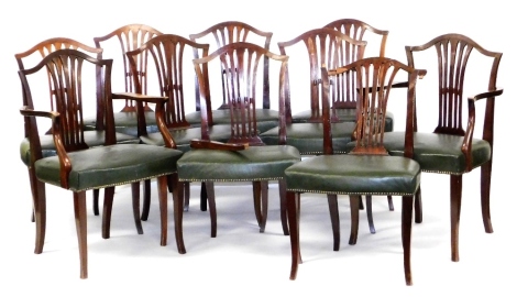 A set of ten George III style mahogany dining chairs, each with a pierced vase shaped splat, a green leather padded upholstered seat with brass studded borders on splayed legs, comprising a pair of carvers and eight single chairs. (AF) The upholstery in t