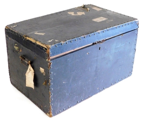 A Victorian black leather bound travel trunk, with a pair of cast iron carrying handles, bearing labels, for GWR, Great Northern, and North Eastern Railway, the latter marked From Scarborough, Blankney and Metheringham GE, 48cm high, 82cm wide, 51cm deep.