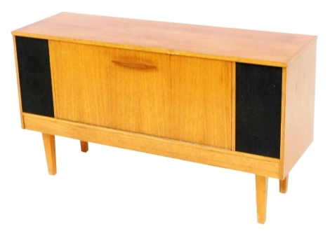 A Stereosound Productions Limited teak cased radiogram, with a lit fully fitted interior, serial number 420266, 64cm high, 115cm wide, 35cm deep.