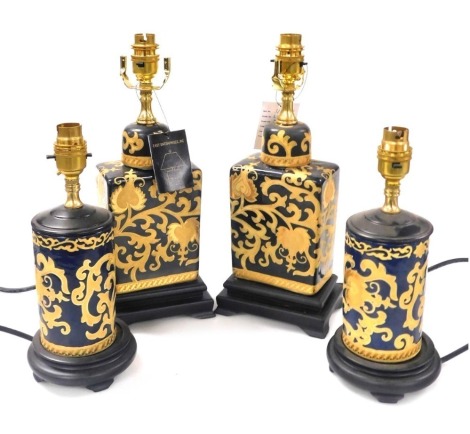 A pair of Chinese black glazed table lamps, of jar and cover form, gilt decorated with scrolling leaves, 35cm high, and a similar pair of table lamps of cylindrical form, 28cm high. (4) Buyer Note: WARNING! This lot contains untested or unsafe electrical 