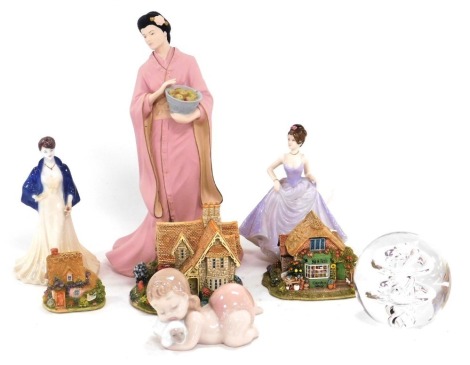 A group of ceramics and glass, comprising a Wedgwood Pearls of the Orient Blossom figure, Coalport porcelain figures models as The Winter Ball, and Good Luck, Nao figure of a baby with a baby lamb, Langham Glass paperweight, and three Liliput Lane sculptu