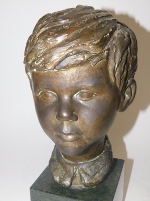 A 20thC bronze bust of a boy, signed indistinctly, raised on a cube form green marble base, 41cm high. - 2