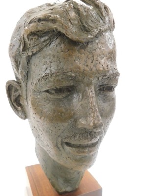 A 20thC hollow cast bronze bust of a gentleman, raised on a wooden base, 35cm high. - 2