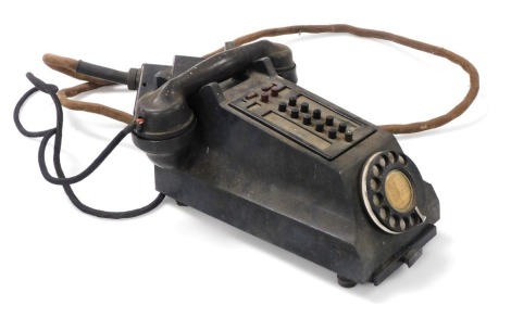 A mid century Bakelite intercom telephone, in black.