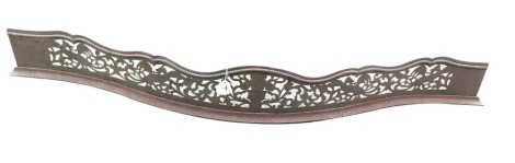 A George III steel fire curb or fender, decorated with pierced decoration of dragons, vase of flowers, etc., 152cm wide.