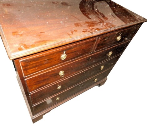 A 19thC mahogany chest of drawers, the top with a moulded edge above two short and three long drawers, with small brass ring handles, on bracket feet, 97cm high, 102cm wide, 54cm deep.