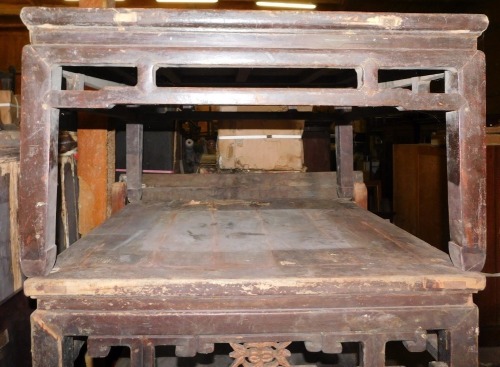 A Chinese elm low coffee table, with square top and pierced shaped frieze and shaped legs, 51cm high, 90cm wide.