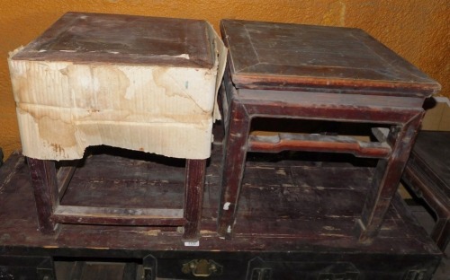 Two similar Chinese elm low tables, each with a shaped frieze and legs, 42cm wide.