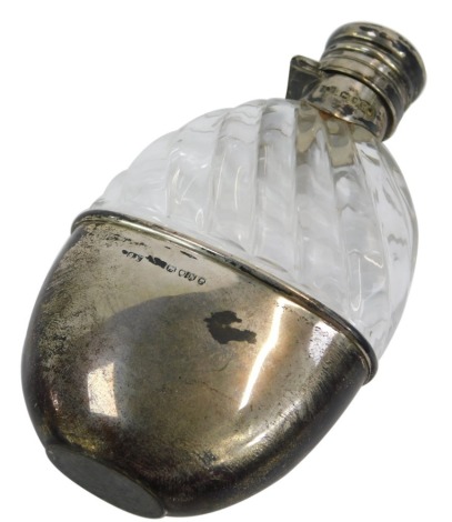 A Victorian silver and moulded glass hip flask, London 1888, 12cm high.