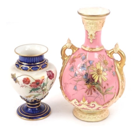 A Royal Worcester porcelain vase, c1893, of twin handled baluster form, shape no 1553, painted with sprays of flowers against a pink ground, printed and painted marks, 15cm high and another on blue and white ground decorated with poppies. (2)