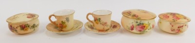 A group of Royal Worcester blush porcelain, comprising two miniature coffee cups and saucers, and three dressing table circular boxes and covers, all painted with floral sprays. (5) - 2