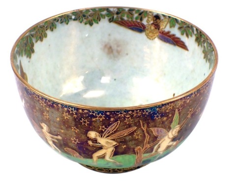 An early 20thC Wedgwood Fairyland lustre bowl, designed by Daisy Maceig-Jones, decorated with woodland elves and dancing fairies, pattern number Z6968, printed and painted marks. (AF)