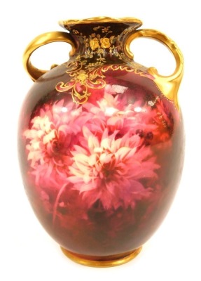 A Royal Doulton porcelain vase, of twin scrolling handled ovoid form, painted with dahlias against a red ground, RA2286, printed and painted marks, 14.5cm high.