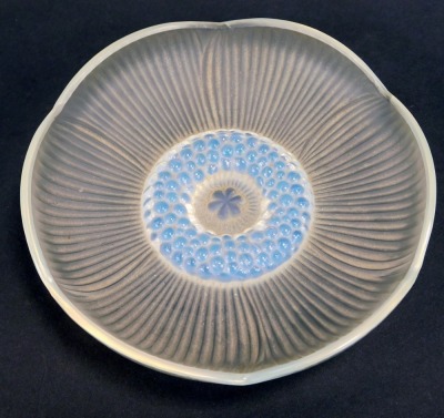 A Verlys of France pin dish, shaped as a flower, with beaded border and central petal, 13.5cm diameter.