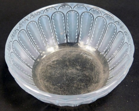 A R Lalique glass bowl, with two tier fluted outer border bearing signature, 13cm diameter.