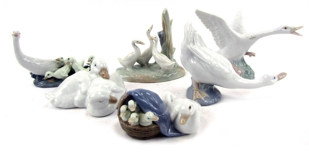 A group of Lladro and Nao duck and goose figures, comprising three