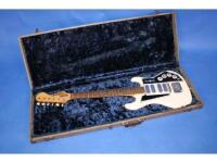 A mid 20thC electric guitar with white painted body by Circuit Four