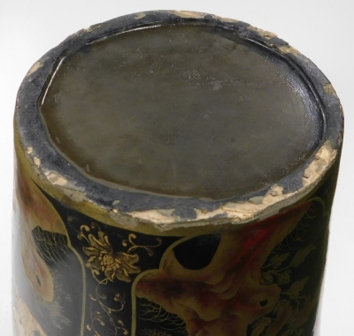 A 19thC Japanese black lacquer floor standing vase, of shouldered cylindrical tapering form, decorated with reserves of women in interior and exterior scenes, surrounded by a background of gilt flowering plants, on a tripod painted wooden stand, 113cm hig - 13