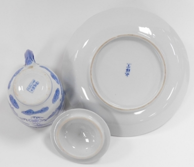 A group of Japanese and Chinese porcelain and pottery, including a Satsuma koro and cover, vase and cover, figure of a Japanese lady playing a samisen, and a Chinese porcelain chocolate cup and cover. (a quantity) - 16